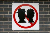 Germans call for ban on kissing in the office