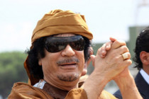 Interpol issues Gaddafi arrest warrant 