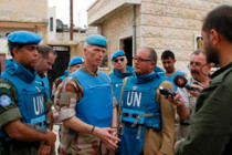 Syria: UN observers come to massacre site