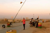 Kurdish groups join to oppose troops