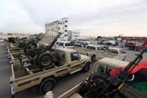 Libyan militias hand over Tripoli bases to government