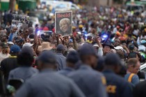 Hunt for mysterious interpreter who faked sign language at Mandela memorial