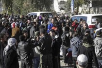 Syria conflict: Aid and evacuations continue in Homs