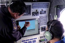 Malaysia plane search widens