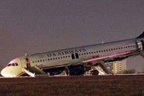 US Airways plane blows tire on takeoff