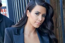 Kim Kardashian diverts attention from her famous derriere