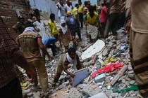 27 dead, more trapped in rubble in 2 India building collapses