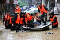 Storms in China kill at least 18