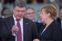 Poroshenko, Merkel discuss further steps to defuse tensions in east Ukraine