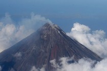 Lava flows from Philippine volcano; thousands flee