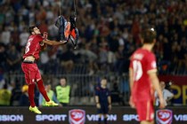 Serbia and Albania game abandoned after drone invasion sparks brawl