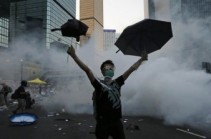 Hong Kong protesters clash with police at government HQ