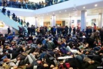 Police arrest 76 at Eric Garner 'die-in' protest at Westfield Shopping Centre