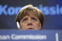 EU ready with sanctions if Ukraine ceasefire violated, Merkel says