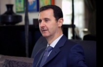 France stresses won't negotiate with Assad