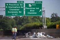 Four dead after plane crashes onto Atlanta highway -local TV