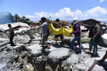 Indonesia earthquake and tsunami: Desperate search for survivors