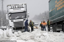 At least 11 people are killed and ski resorts evacuated amid avalanche fears as huge snowstorm hits across Europe