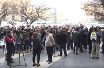 Employees of pawnshops and currency exchange points protest in front of government building