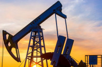 Oil prices edge higher, but future demand concerns cap gains