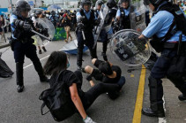 Hong Kong: Police and protesters clash on handover anniversary