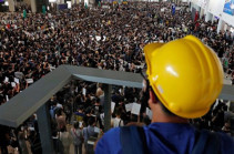 Hong Kong protests: Airport cancels flights as thousands occupy