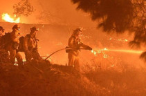 California faces huge power cuts as wildfires rage