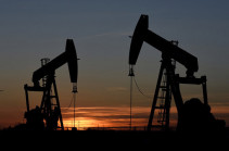 Oil prices rise in Christmas Eve trade amid supply cuts