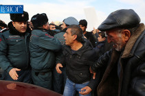 Relatives of killed conscript Arthur Aghajanyan gather outside government building demanding meeting with PM