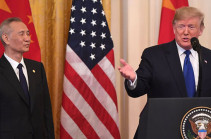 US and China sign deal to ease trade war