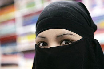 Belgium bans wearing niqabs or burqas