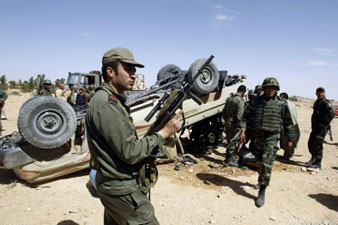 Forces loyal to Gaddafi stand in Tripoli against the rebels 