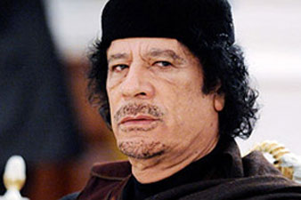 Gaddafi makes televised speech, vows never to surrender