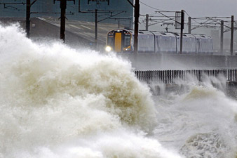 Two killed as storms hit UK