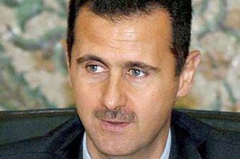 Assad warned Hollande against inciting chaos and crisis