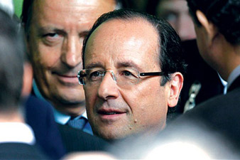 Francois Hollande cuts his own salary