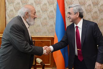 President receives famous photographer Ara Guler 