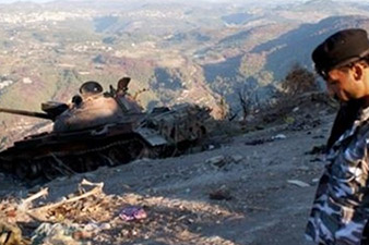 Thirty killed in heavy fighting in Syrian mountains