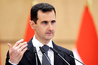 Assad calls for striking rebels 'with iron fist'