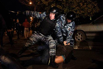 Russian police detain killing suspect after race riot