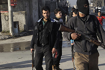 Nearly 500 killed in fighting between Syrian rebels and Al-Qaeda