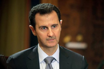 Syria's Assad expects to run again, rejects power deal