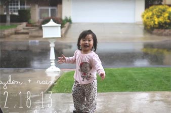 A little girl experiences rain for the very first time