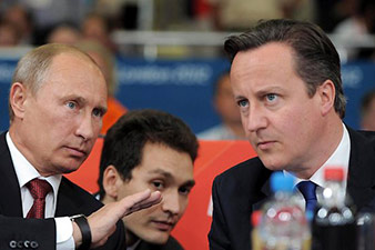 Putin tells Merkel, Cameron that Crimea referendum legal