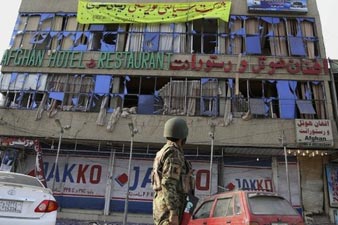 Afghan police station attack leaves at least 18 people dead