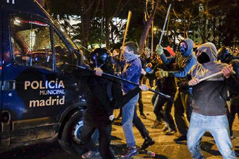 Anti-austerity protest turns violent in Spanish capital