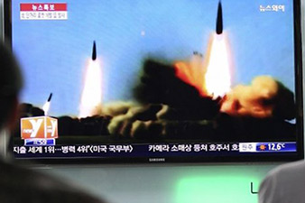 North Korea test-fires mid-range missiles