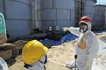 Fukushima radiation levels drop, still dangerous – report