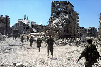 Syria conflict: Government troops retake Homs Old City