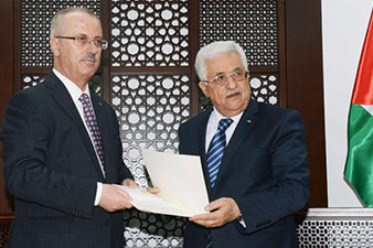 Abbas asks PM Rami Hamdallah to head Fatah-Hamas unity cabinet